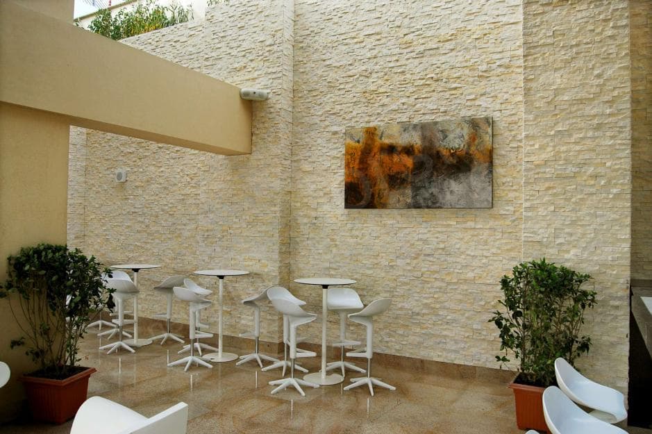 Norstone Ivory Rock Panels on large wall at a restaurant in Abu Dhabi
